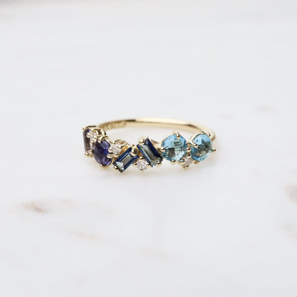 
                      
                        RNG-14K Yellow Gold Mixed Cut Blue Topaz Ring
                      
                    