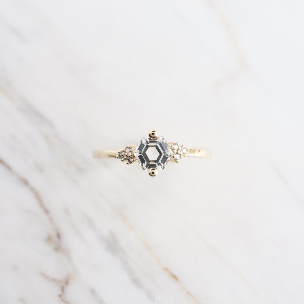 
                  
                    RNG-14K Yellow Gold White Topaz Hexagon Ring
                  
                