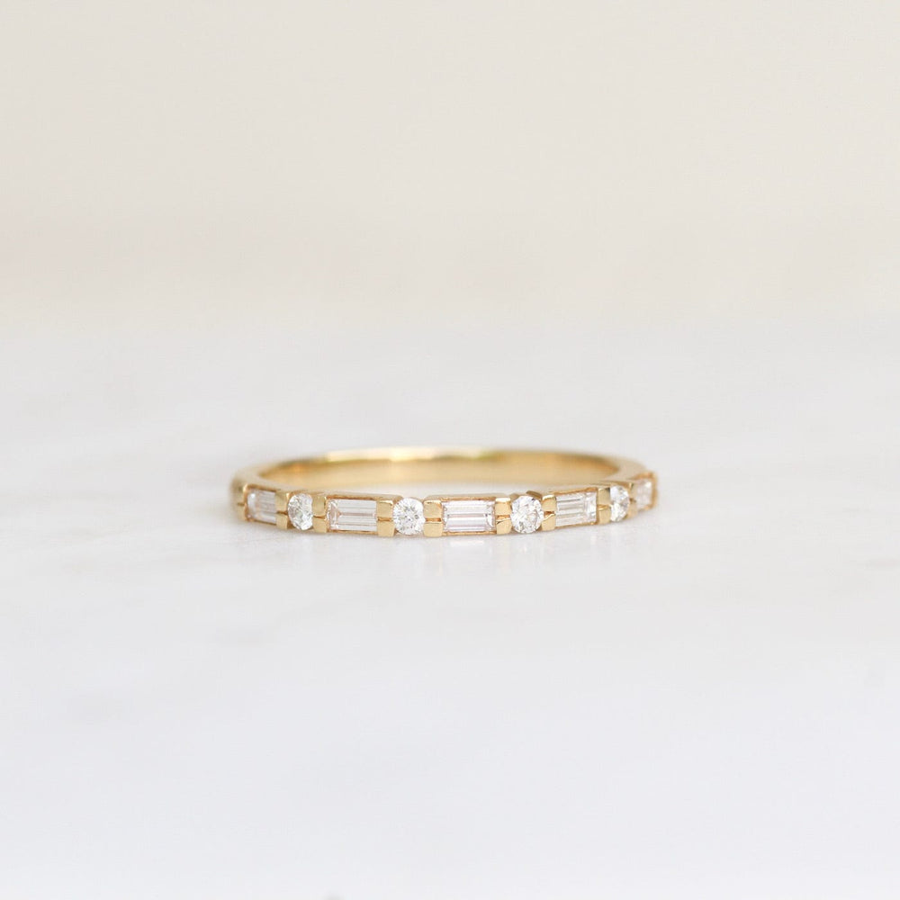 
                      
                        RNG-18K Baguette & Round Diamond Band
                      
                    