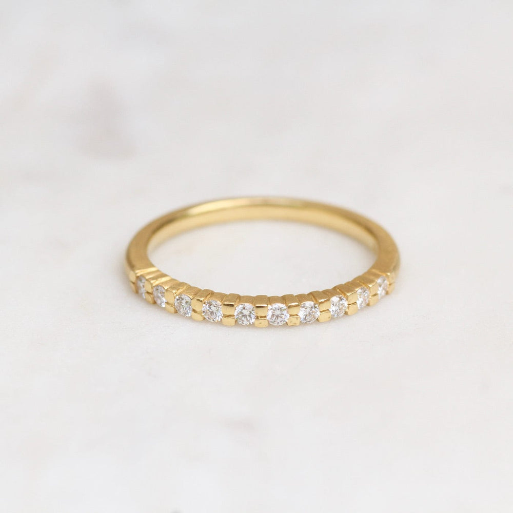 
                  
                    RNG-18K Gold Claw Set Diamond Band
                  
                