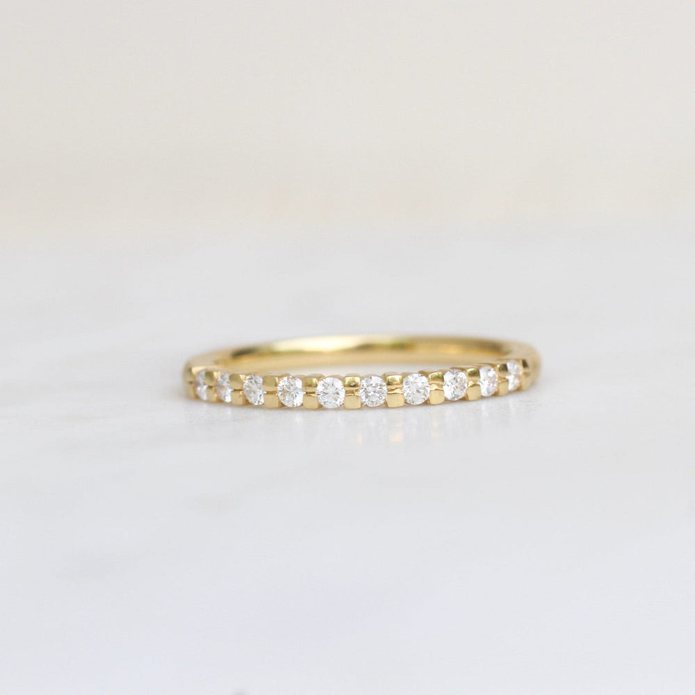 
                  
                    RNG-18K Gold Claw Set Diamond Band
                  
                