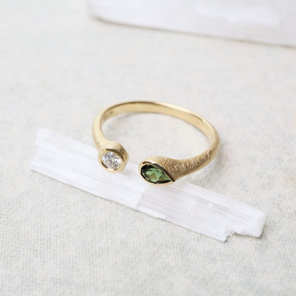 
                      
                        RNG-18K Open Boulder Diamond and Green Tourmaline Ring
                      
                    