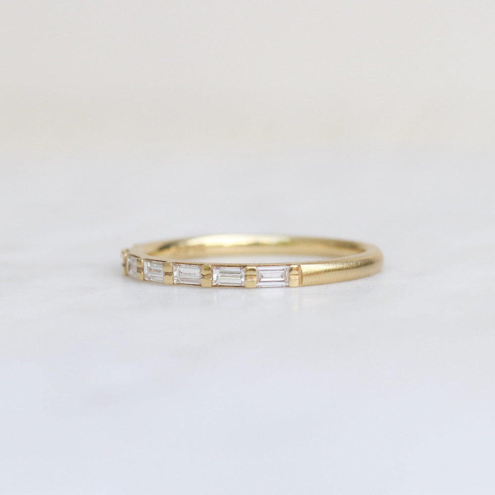 
                  
                    RNG-18K Seven Diamond Baguette Band
                  
                