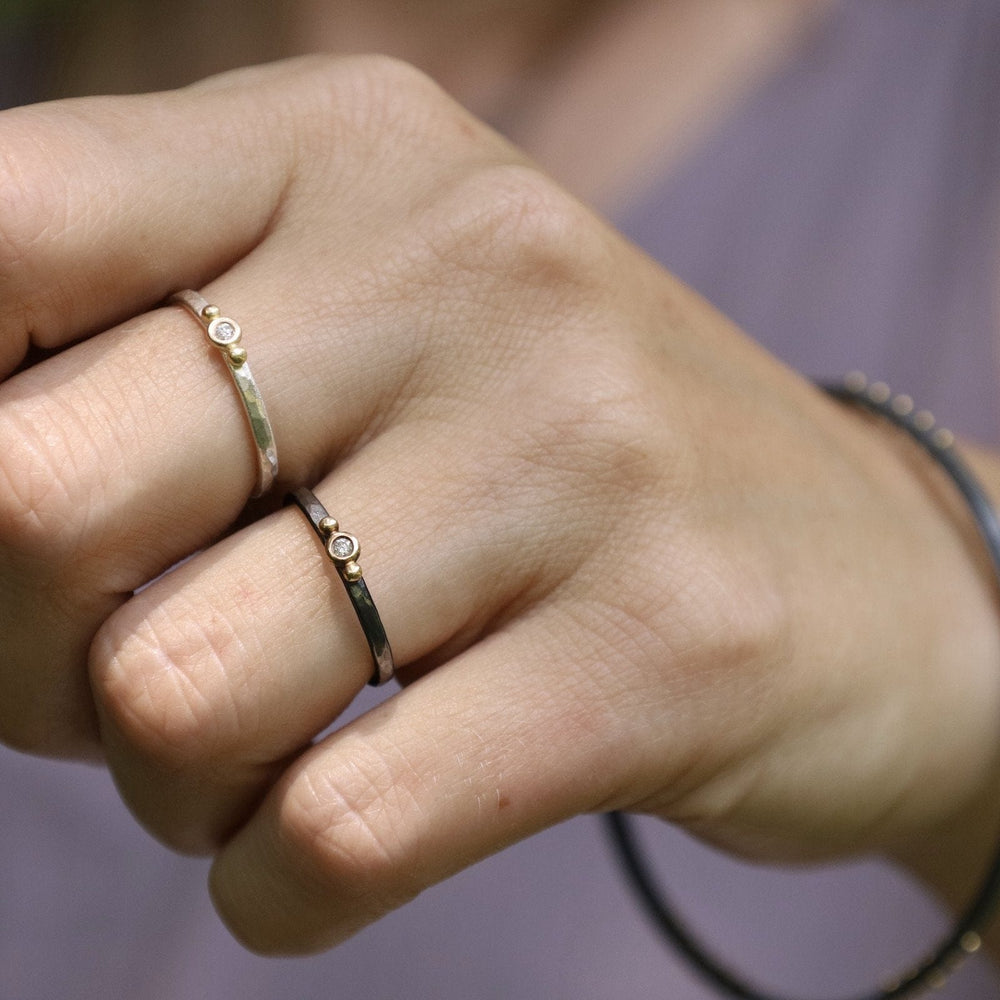 
                      
                        RNG-18K Vega Stacking Ring - Oxidized Silver & 18k Gold with Diamond
                      
                    