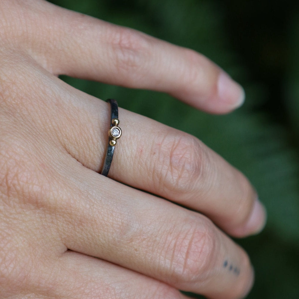 
                      
                        RNG-18K Vega Stacking Ring - Oxidized Silver & 18k Gold with Diamond
                      
                    