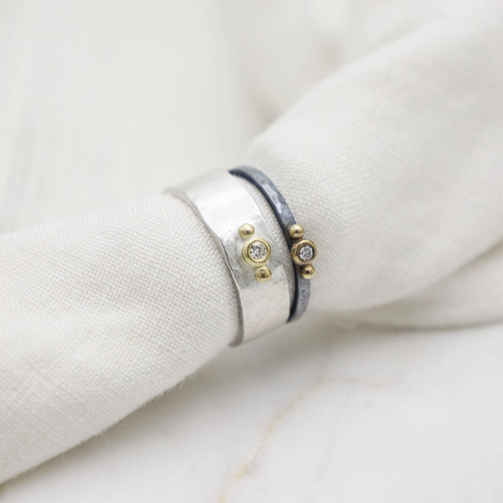 
                      
                        RNG-18K Vega Stacking Ring - Oxidized Silver & 18k Gold with Diamond
                      
                    