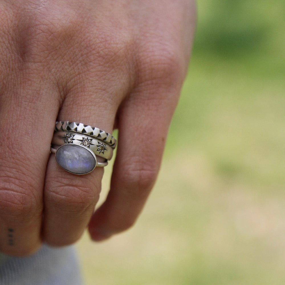 
                      
                        RNG 2mm Hand Carved Sterling Silver Band
                      
                    