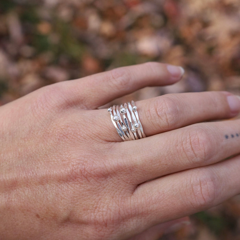 
                  
                    RNG 7 Tiny Bands Stacking Ring
                  
                