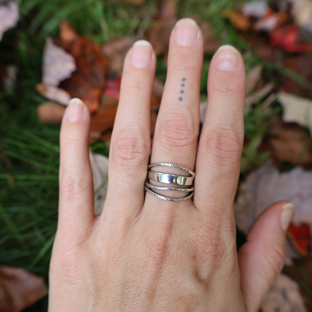 
                      
                        RNG Abstract Sterling Silver Ring with Mixed Textures
                      
                    