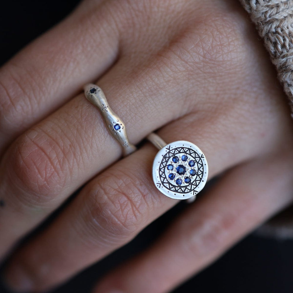 
                      
                        RNG Blue Sapphire Wavy Ring
                      
                    