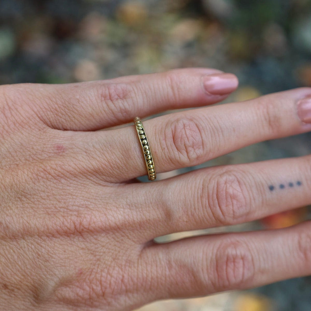 
                      
                        RNG-BRASS Solid Brass Stacking Ring with Round Granulation
                      
                    