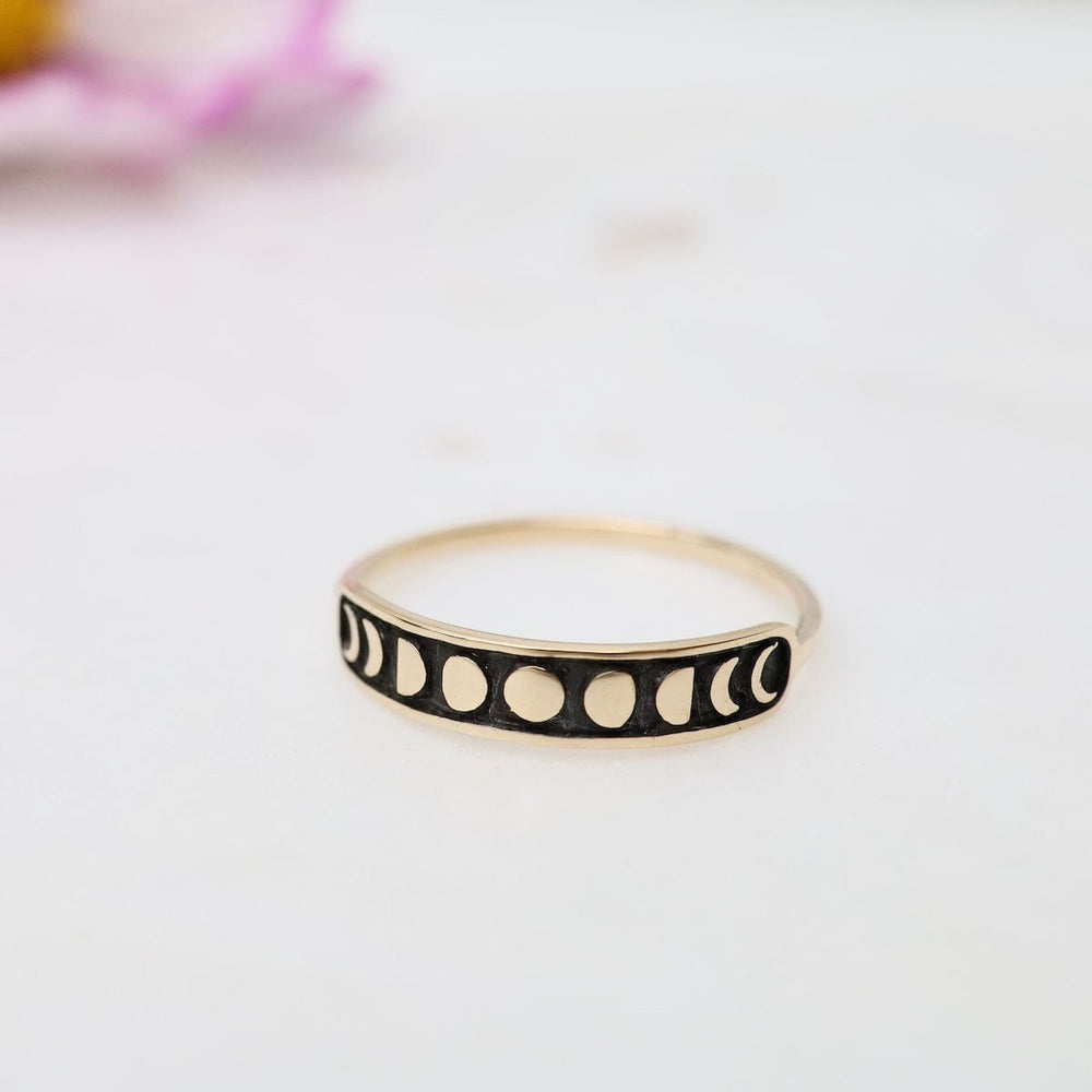 
                      
                        RNG Bronze Moon Phase Ring
                      
                    