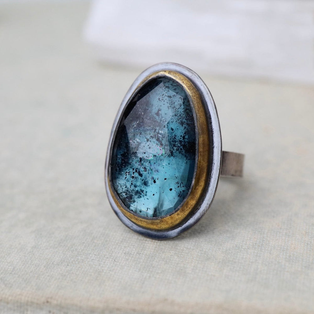 
                      
                        RNG Crescent Rim Ring in Teal Kyanite
                      
                    