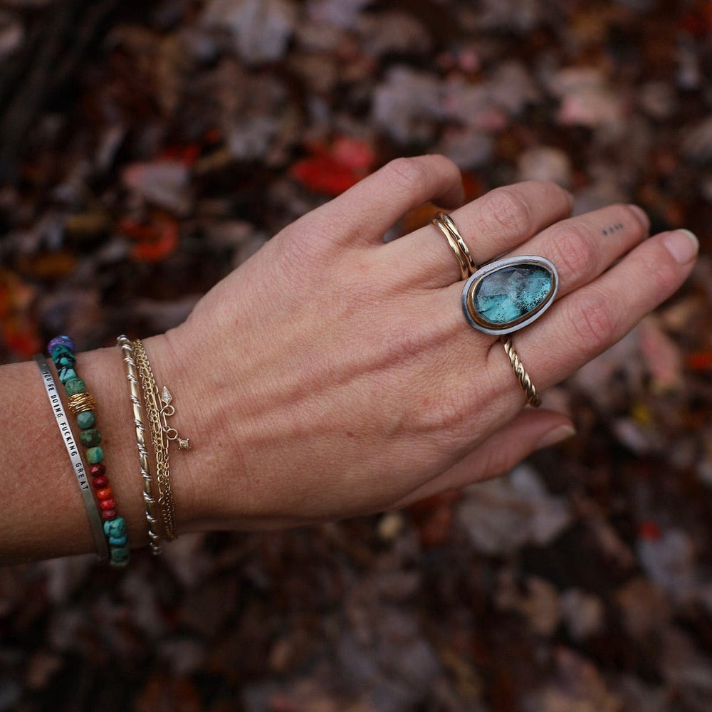 
                      
                        RNG Crescent Rim Ring in Teal Kyanite
                      
                    