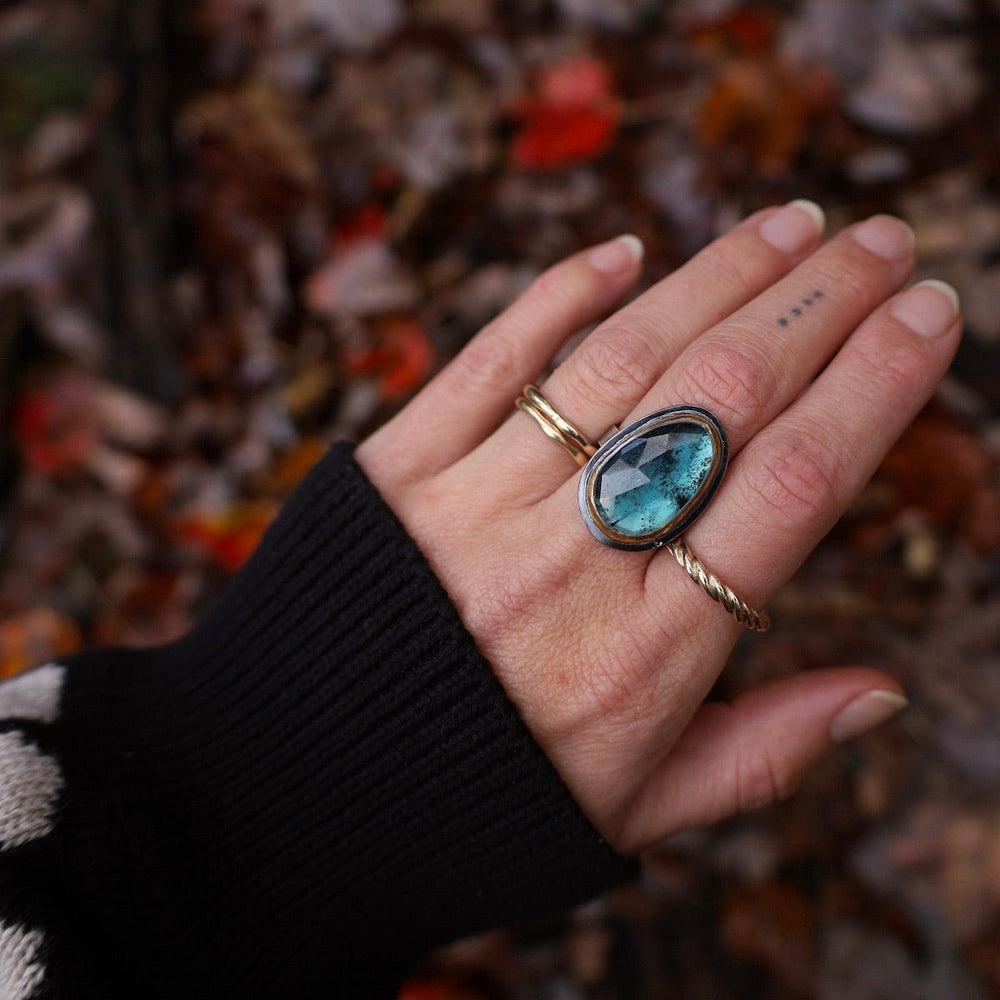 
                      
                        RNG Crescent Rim Ring in Teal Kyanite
                      
                    