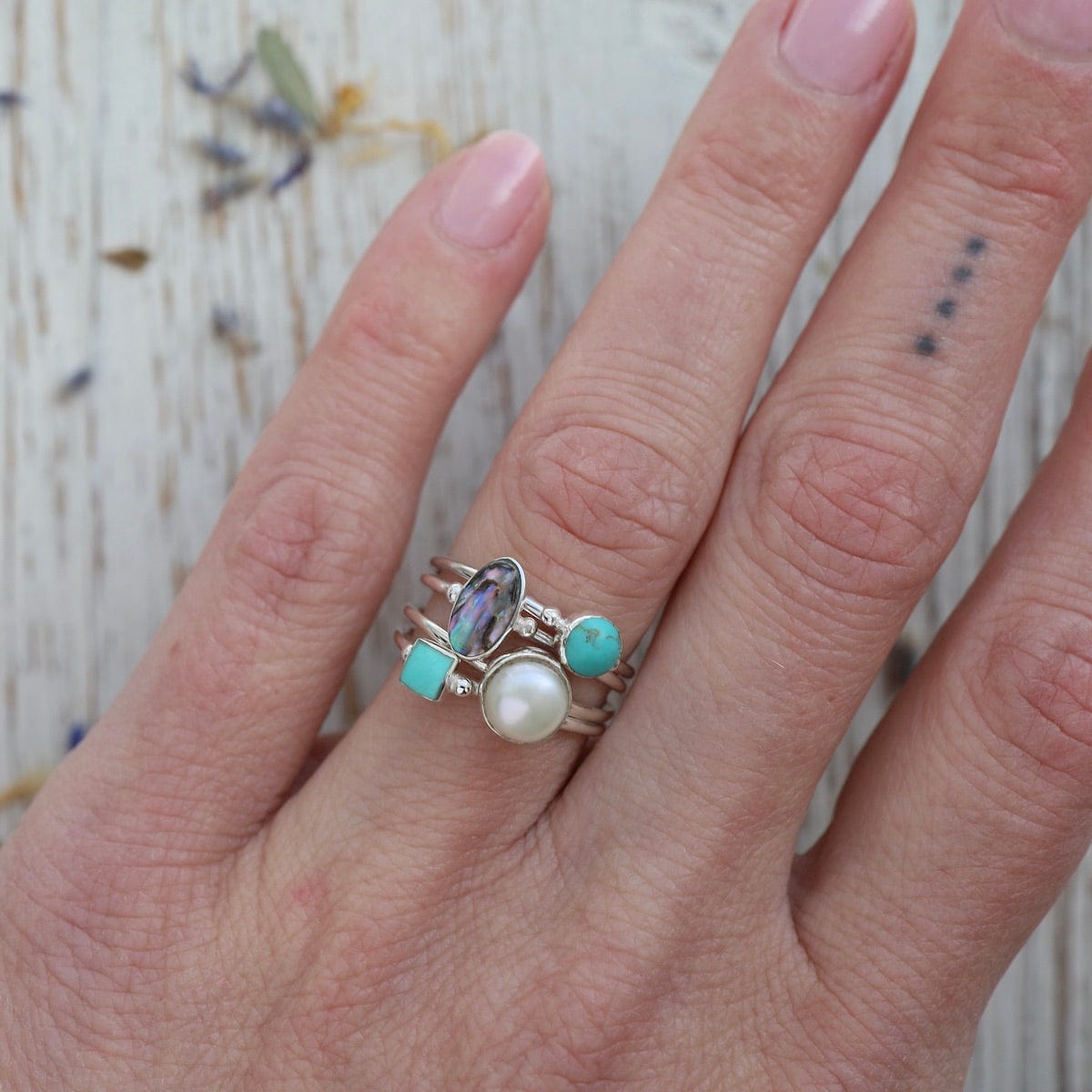 Delicate Compressed Turquoise Round Silver Ring – Dandelion