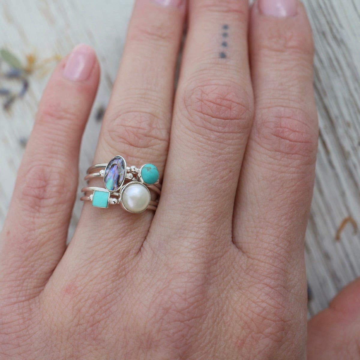 Delicate Compressed Turquoise Round Silver Ring