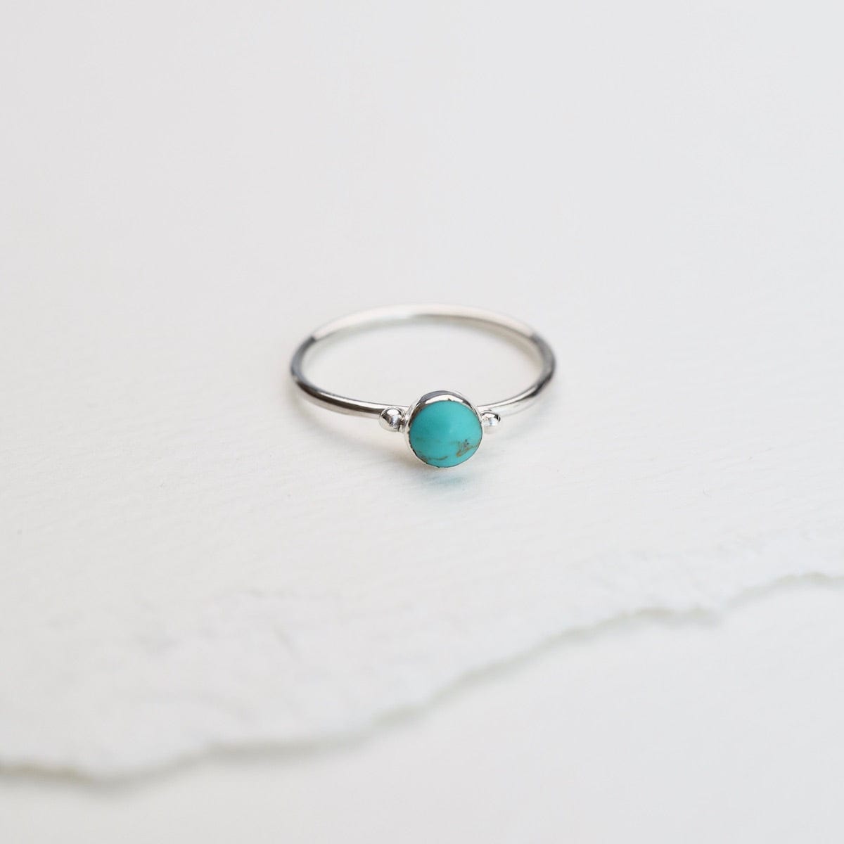 RNG Delicate Compressed Turquoise Round Silver Ring