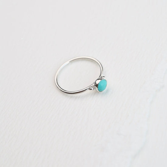 RNG Delicate Compressed Turquoise Round Silver Ring