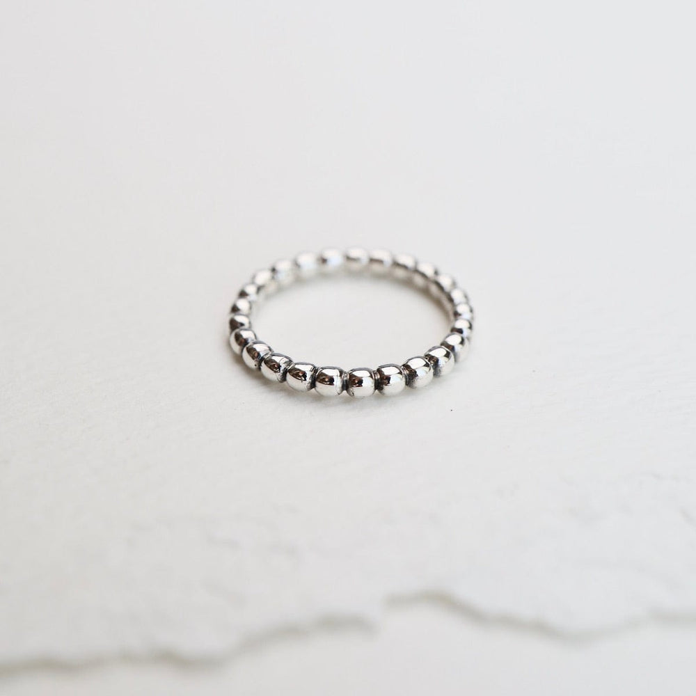 
                      
                        RNG Dot Silver Stacking Ring
                      
                    