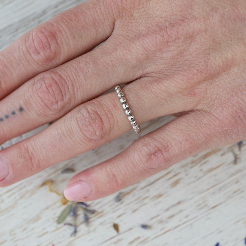 
                      
                        RNG Dot Silver Stacking Ring
                      
                    