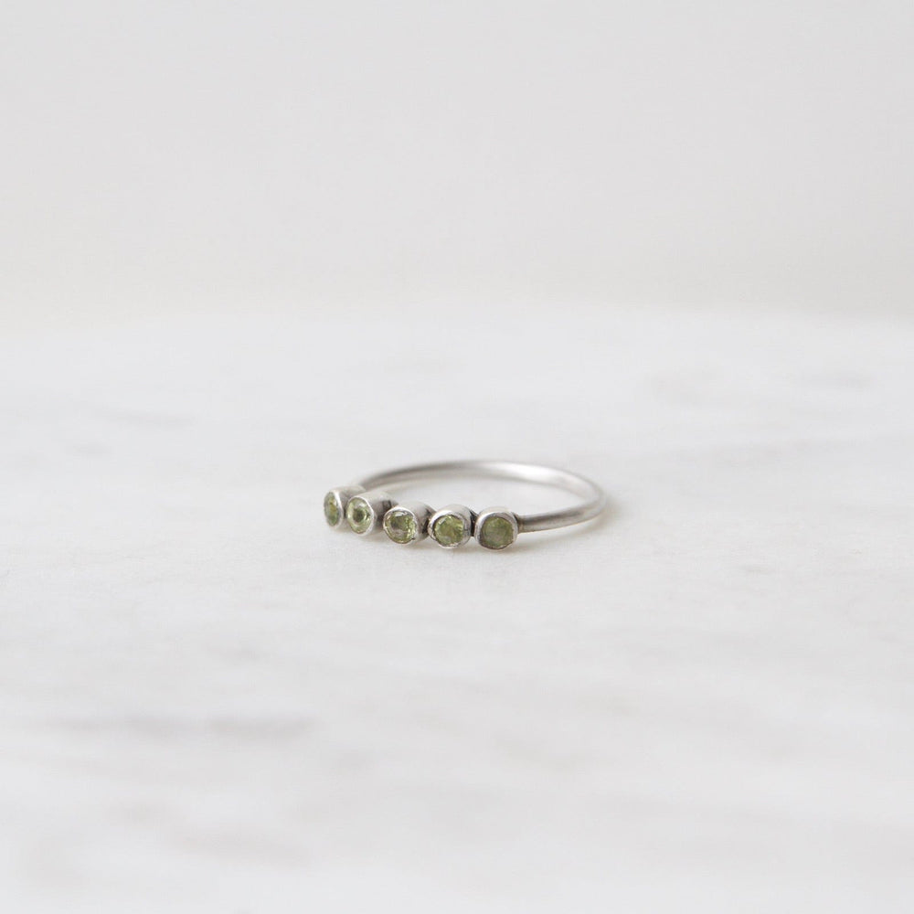 
                      
                        RNG Five Faceted Peridot in Sterling Silver Ring
                      
                    