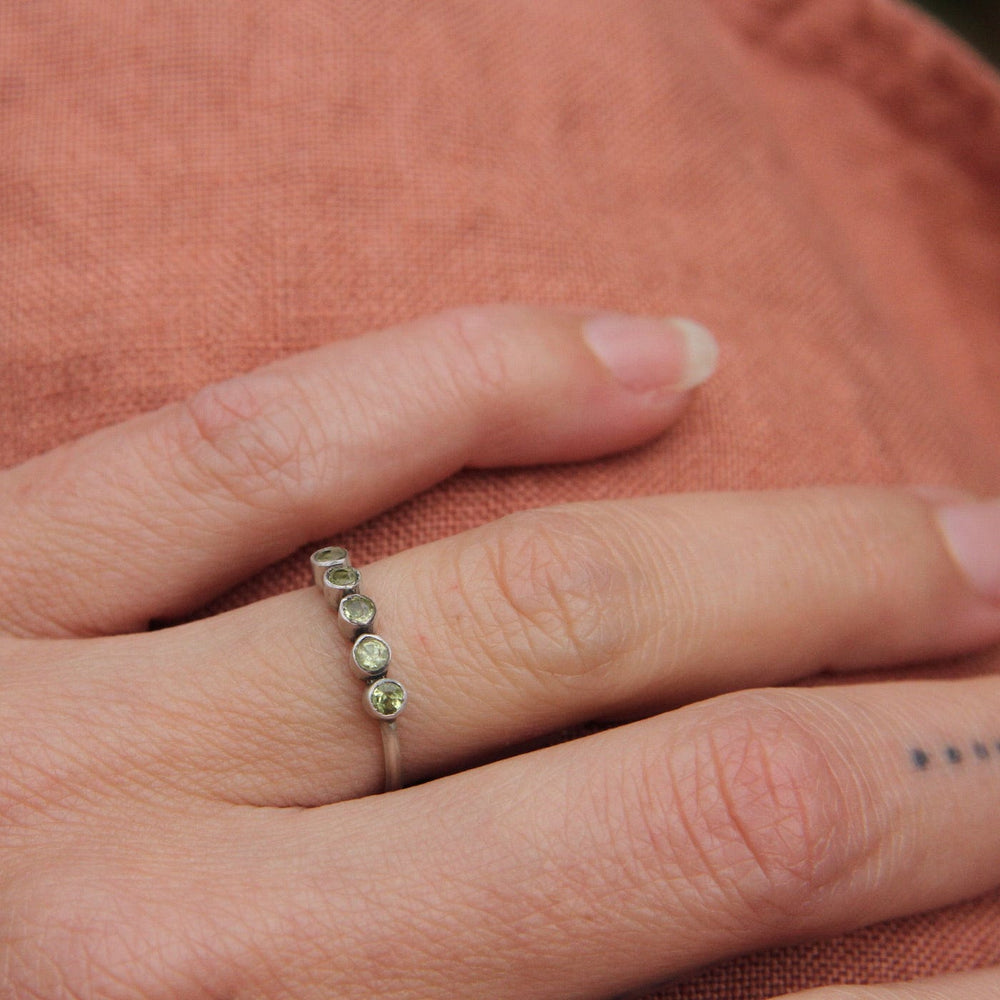 
                      
                        RNG Five Faceted Peridot in Sterling Silver Ring
                      
                    