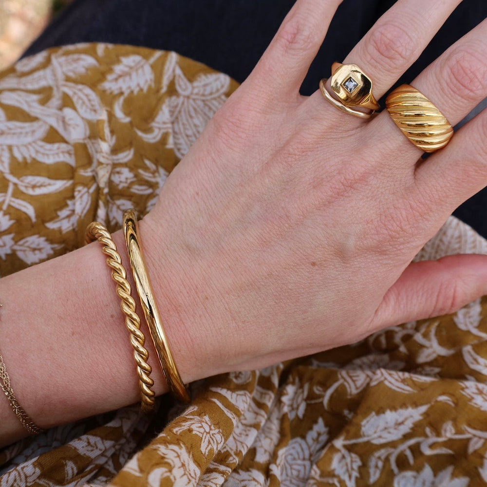 
                  
                    RNG-GPL LOU // The striated ring - 18k gold plated stainle
                  
                