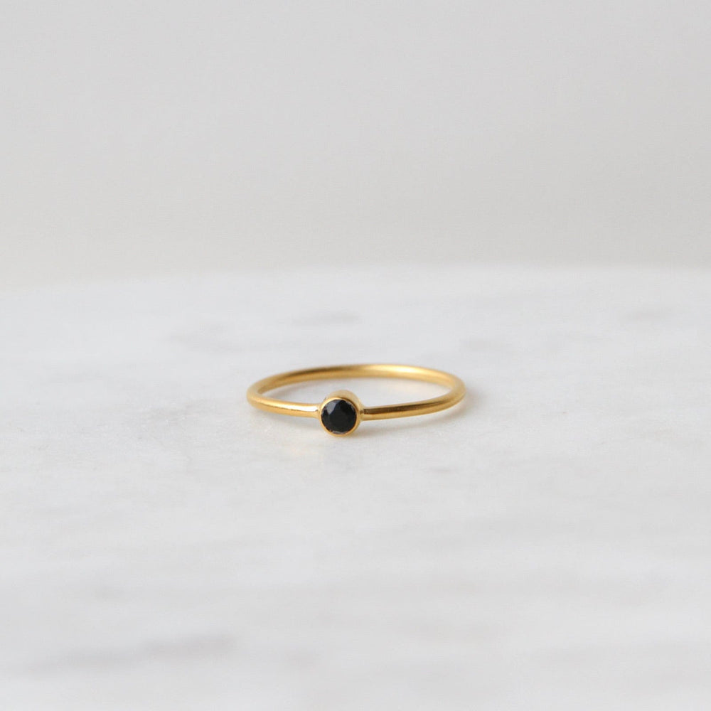 
                      
                        RNG-GPL Tiny Faceted Single Black Onyx in Gold Plated Brass Ring
                      
                    