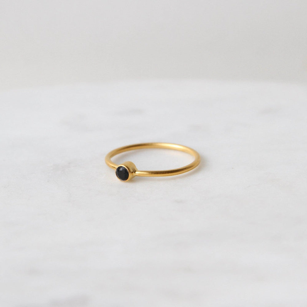 
                      
                        RNG-GPL Tiny Faceted Single Black Onyx in Gold Plated Brass Ring
                      
                    