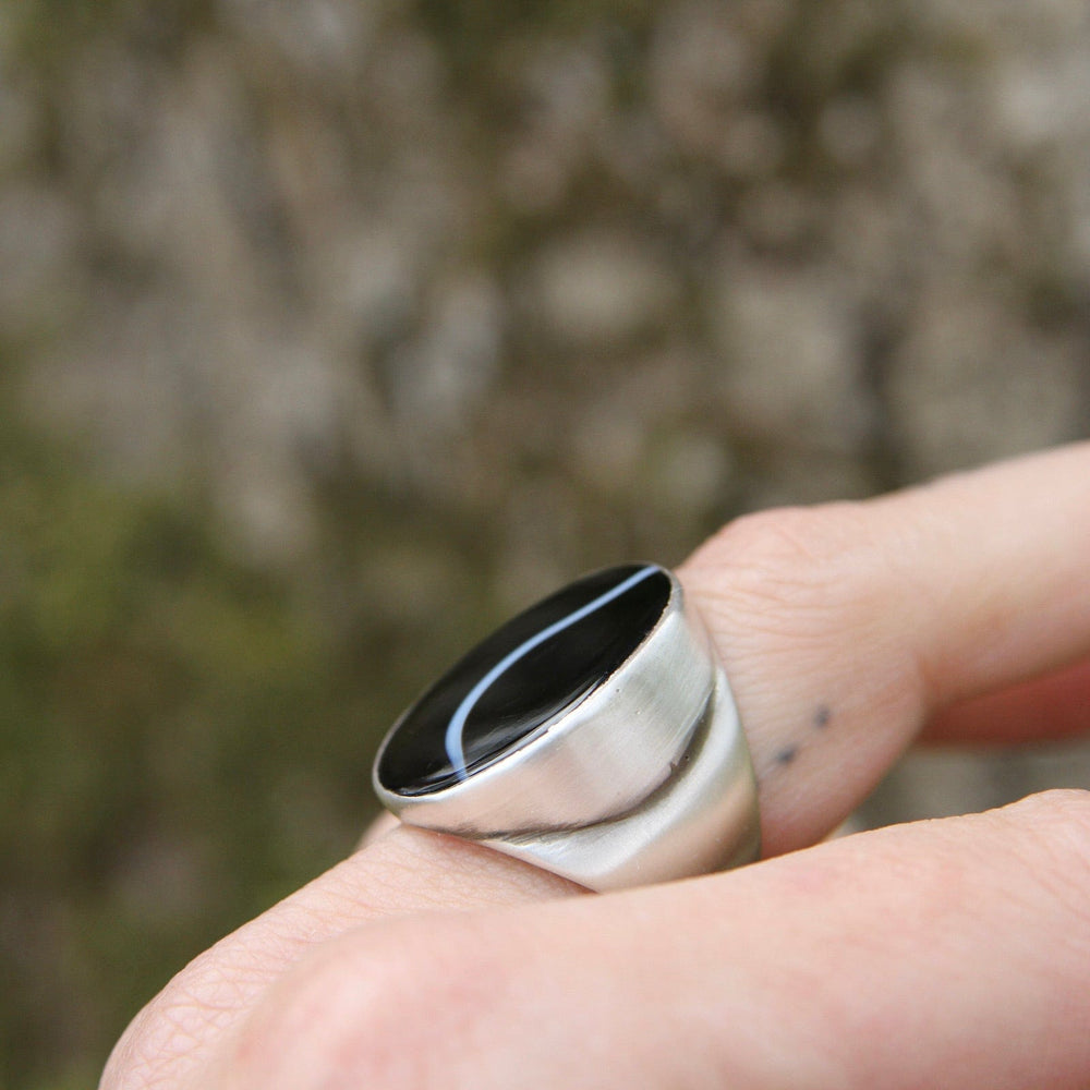 
                      
                        RNG Large Oval Flat Cut Banded Black Onyx Ring
                      
                    