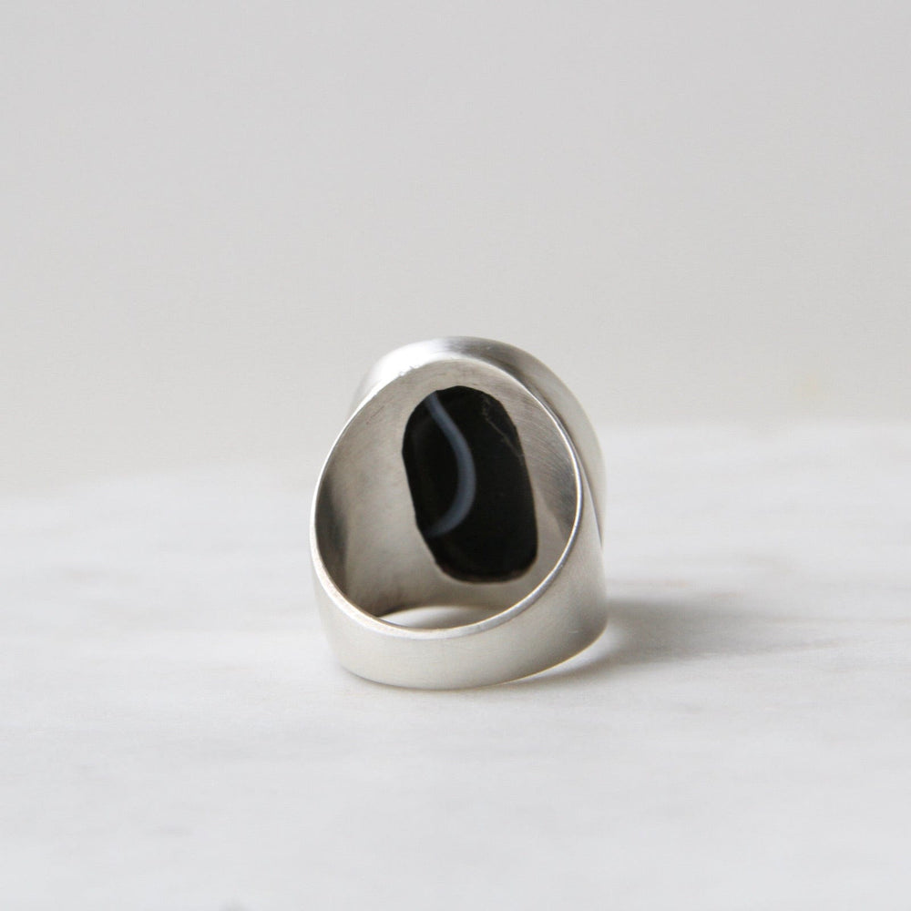 
                      
                        RNG Large Oval Flat Cut Banded Black Onyx Ring
                      
                    