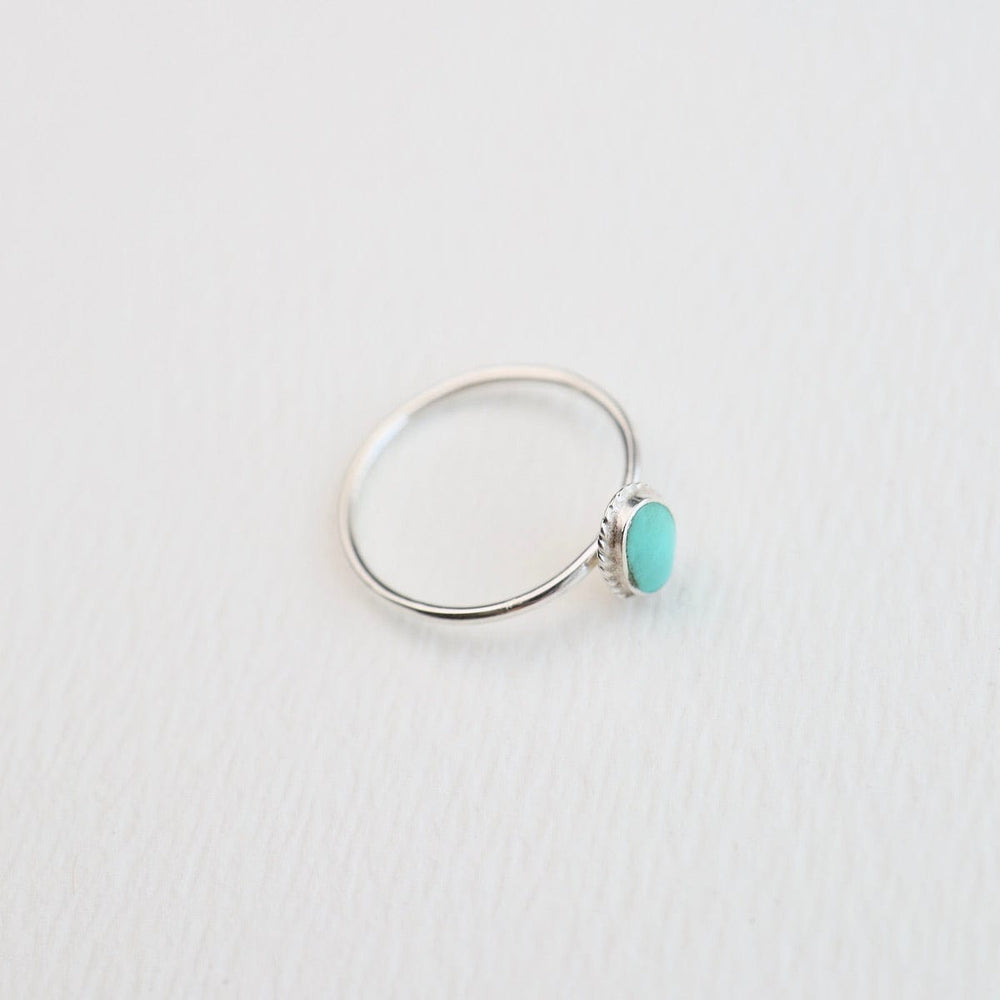 
                  
                    RNG Oval Compressed Turquoise Silver Ring
                  
                