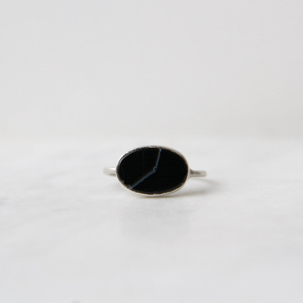 
                      
                        RNG Oval Flat Cut Banded Black Onyx in Sterling Silver Ring
                      
                    