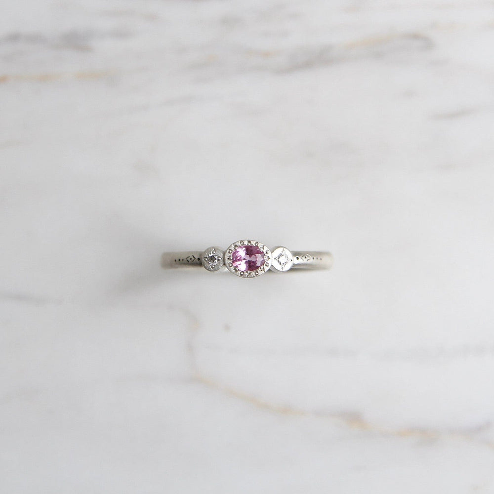 
                      
                        RNG Oval & Round Charm Ring in Pink Sapphire
                      
                    