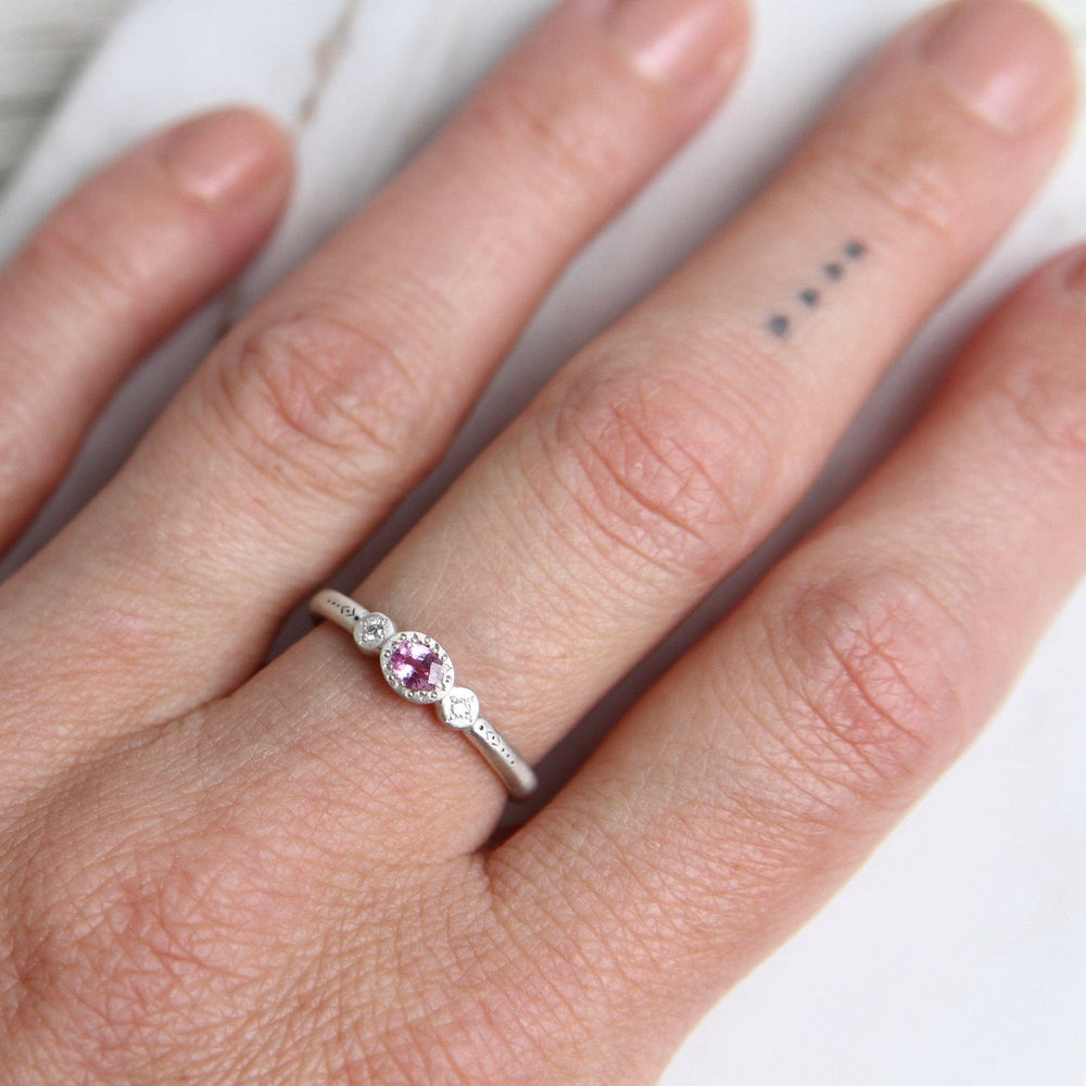 
                      
                        RNG Oval & Round Charm Ring in Pink Sapphire
                      
                    