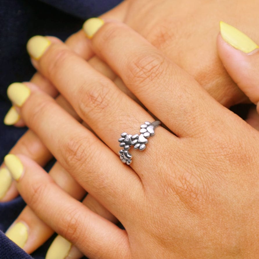 
                      
                        RNG Paw Prints Ring
                      
                    