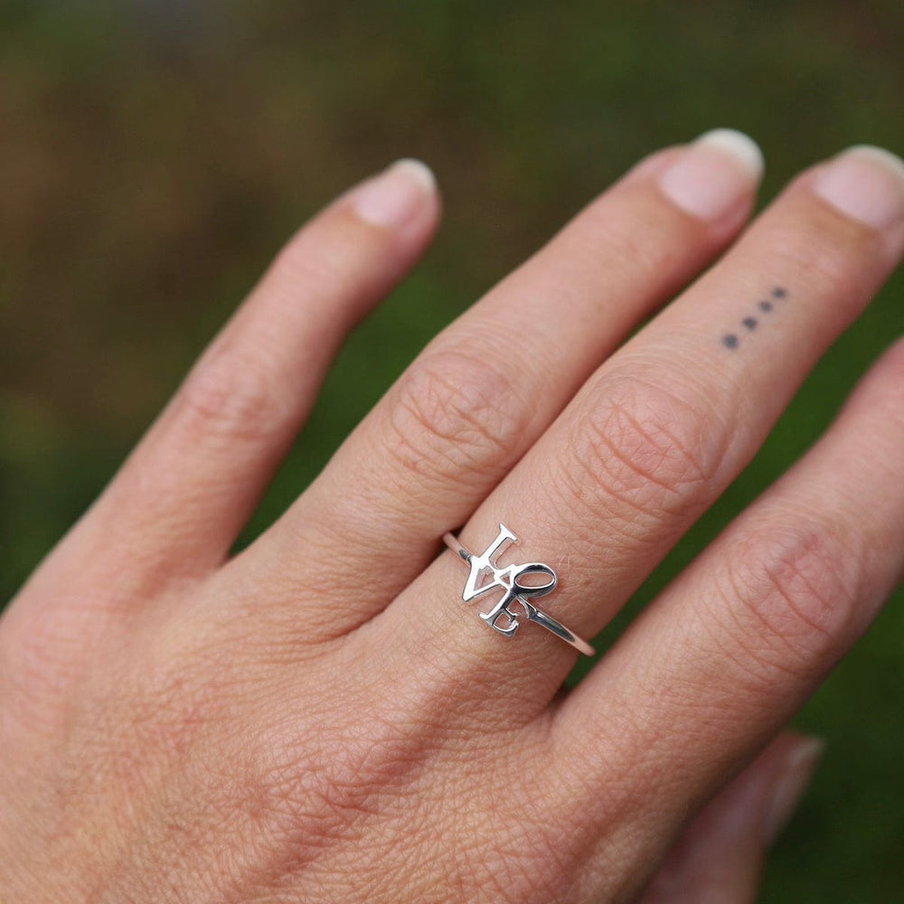 
                      
                        RNG Polished Silver Mini LOVE Ring
                      
                    