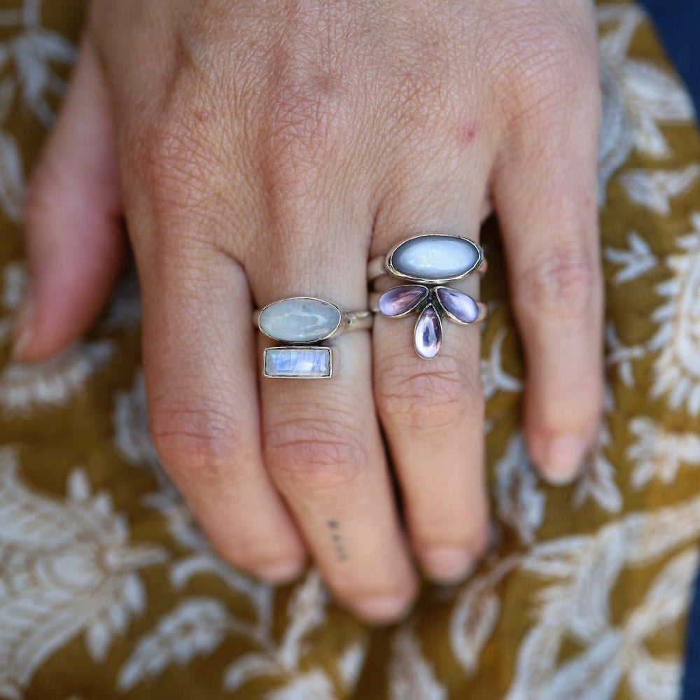 
                      
                        RNG Rainbow Moonstone Oval Cabochon & Faceted Baguette Ring
                      
                    