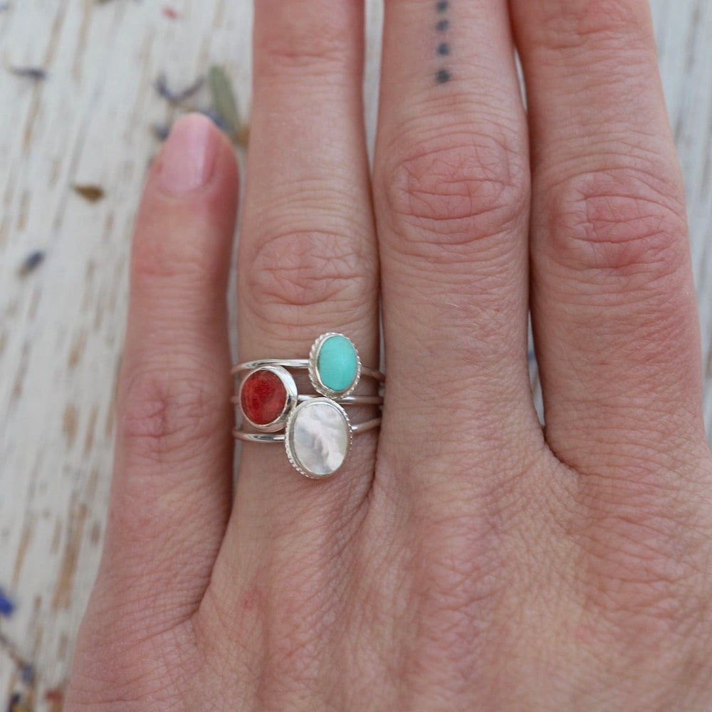 
                  
                    RNG Round Compressed Red Coral Silver Ring
                  
                