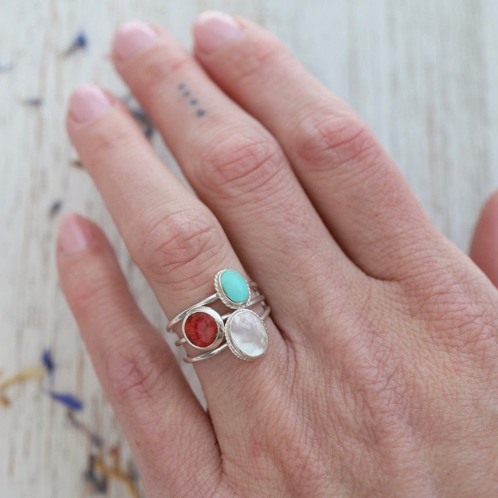 
                  
                    RNG Round Compressed Red Coral Silver Ring
                  
                