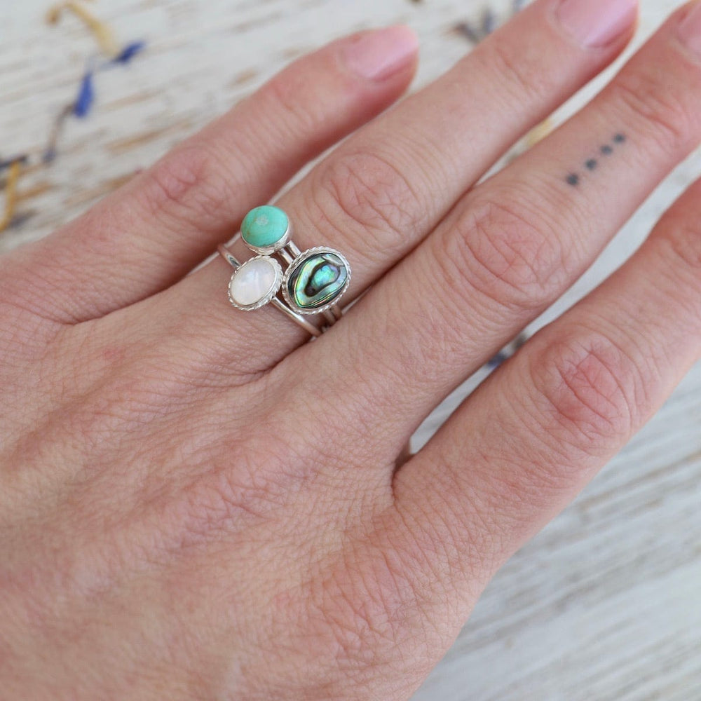 
                  
                    RNG Round Compressed Turquoise Silver Ring
                  
                