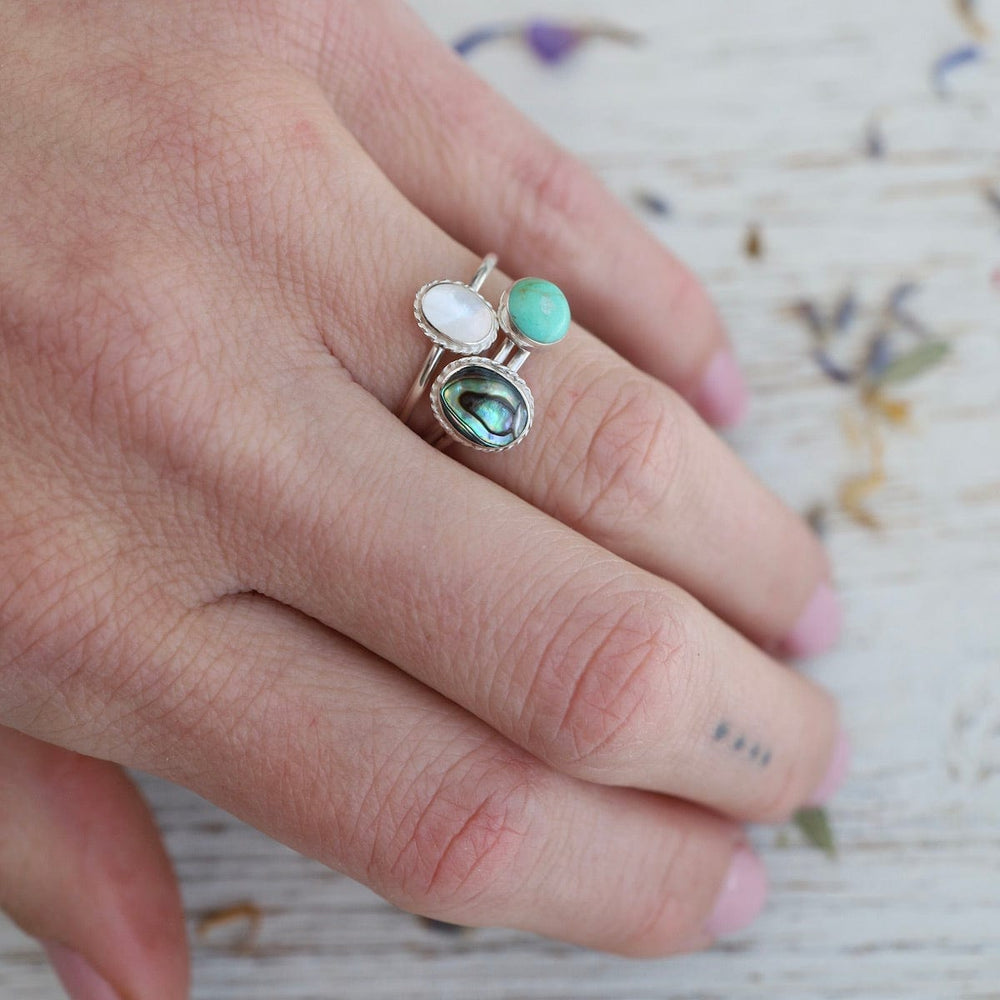 
                  
                    RNG Round Compressed Turquoise Silver Ring
                  
                