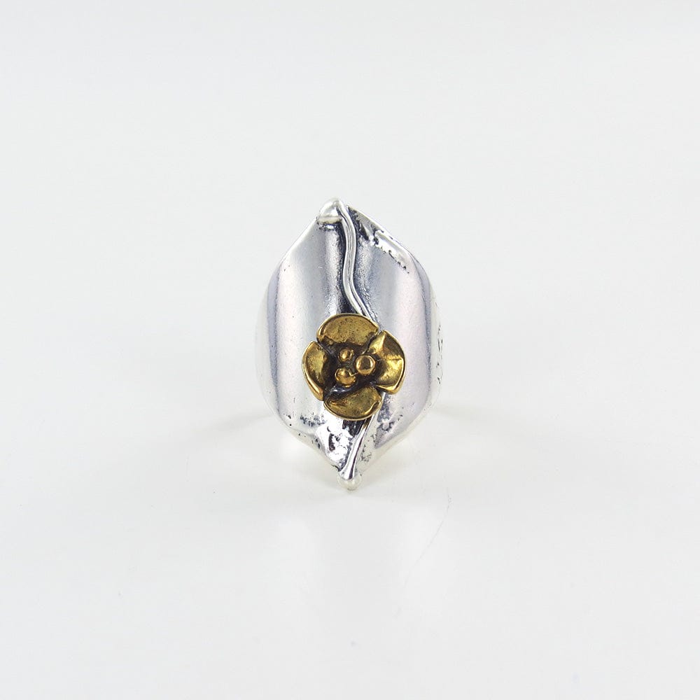 
                      
                        RNG SHIELD RING WITH BRASS FLOWER
                      
                    