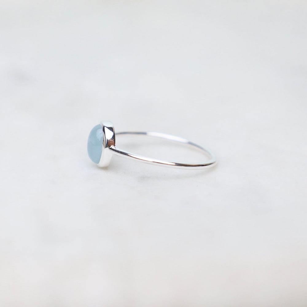 
                  
                    RNG Silver Bezel Set Cabochon Aquamarine Ring
                  
                