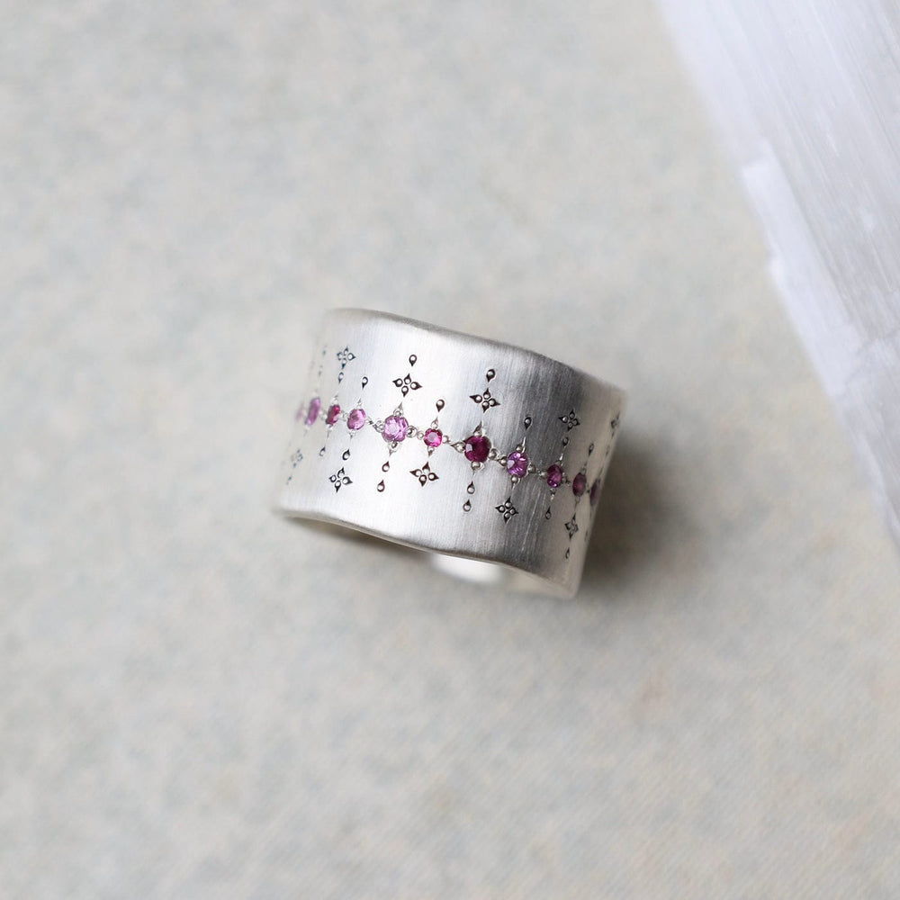 
                      
                        RNG Single Organic Wide Band in Pink Sapphire & Ruby
                      
                    