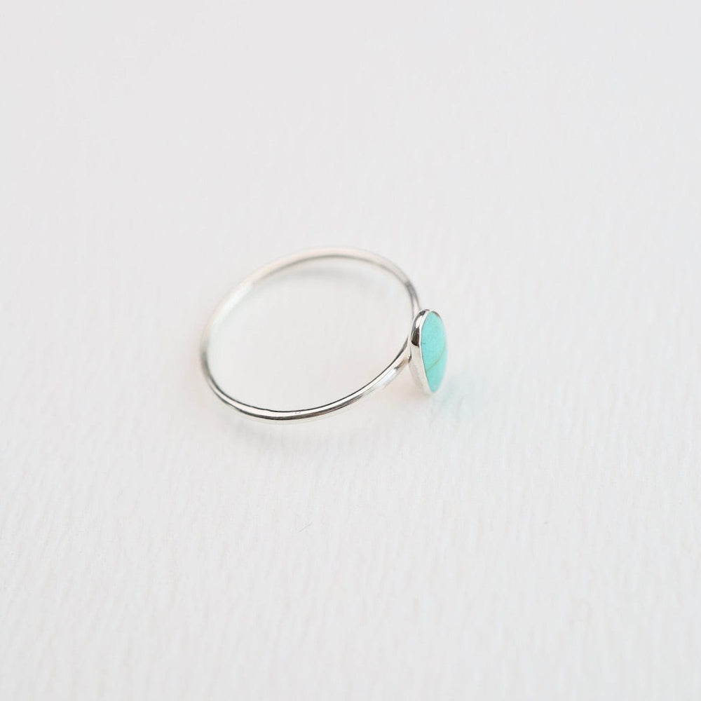 
                  
                    RNG Small Oval Compressed Turquoise Silver Ring
                  
                