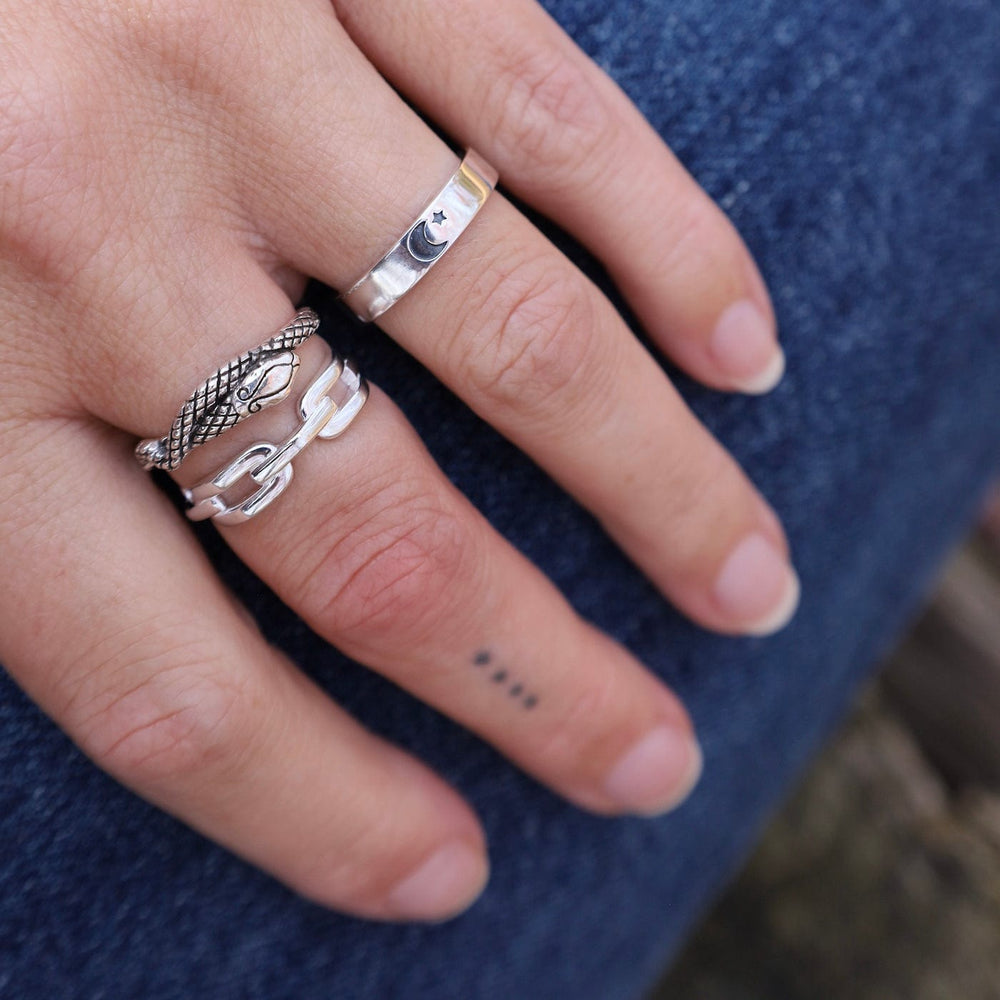 
                  
                    RNG Snake Skin Band Ring
                  
                