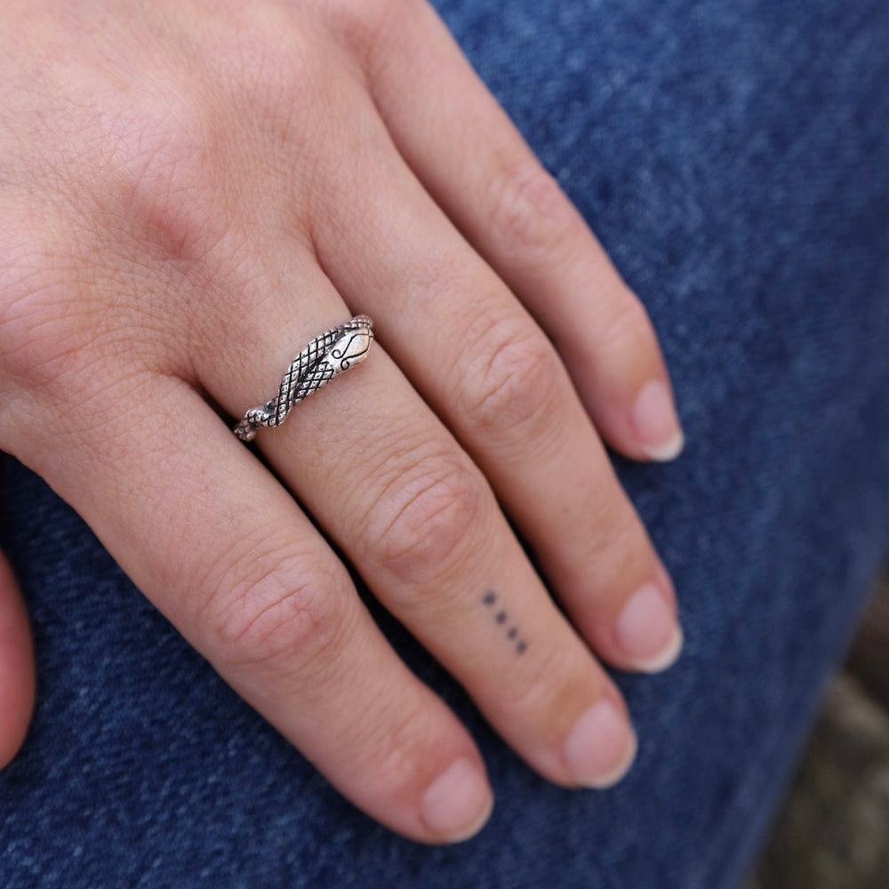 
                  
                    RNG Snake Skin Band Ring
                  
                