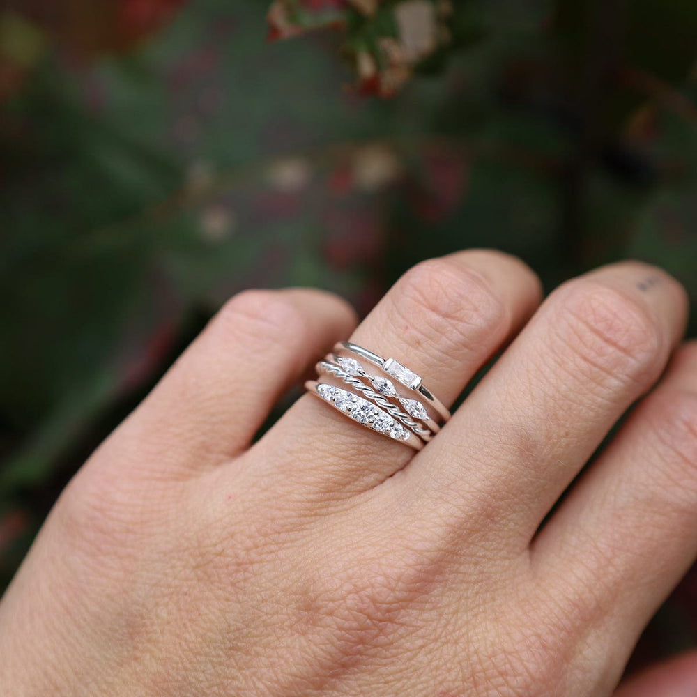 
                  
                    RNG Sterling Silver Band with Channel Set CZ Baguette Ring
                  
                